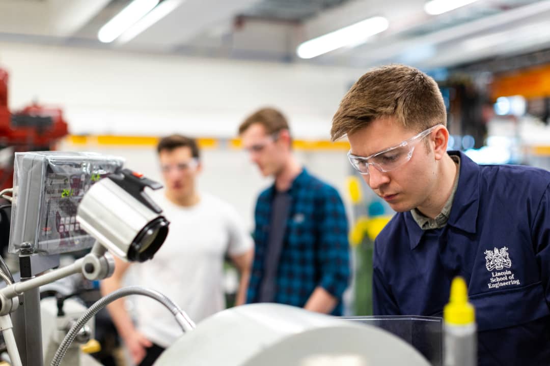 Engineering students gaining hands-on practical training in the workshop